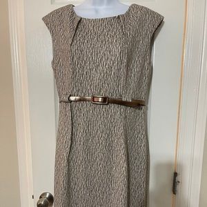 Dress with detailed neckline, belt attached